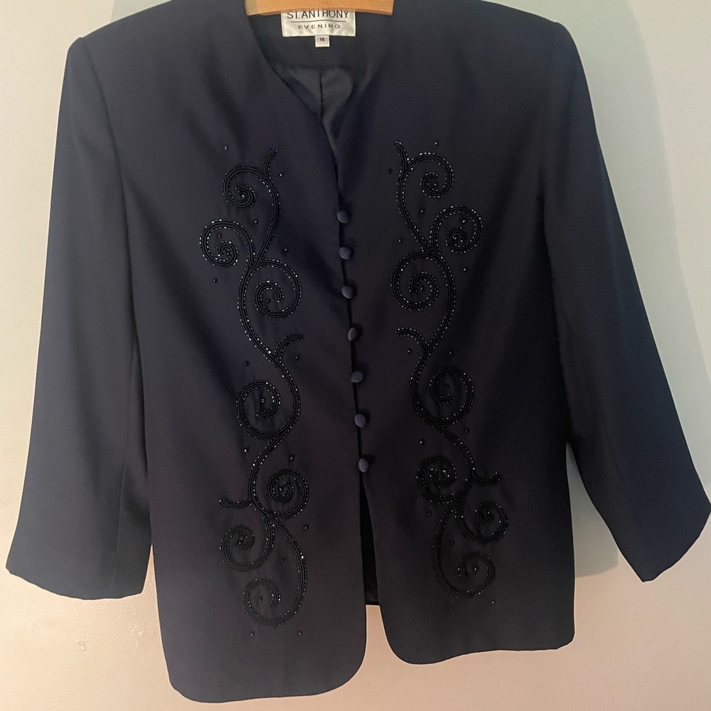 Blue Blazer with Intricate Embellishments and Structured Silhouette